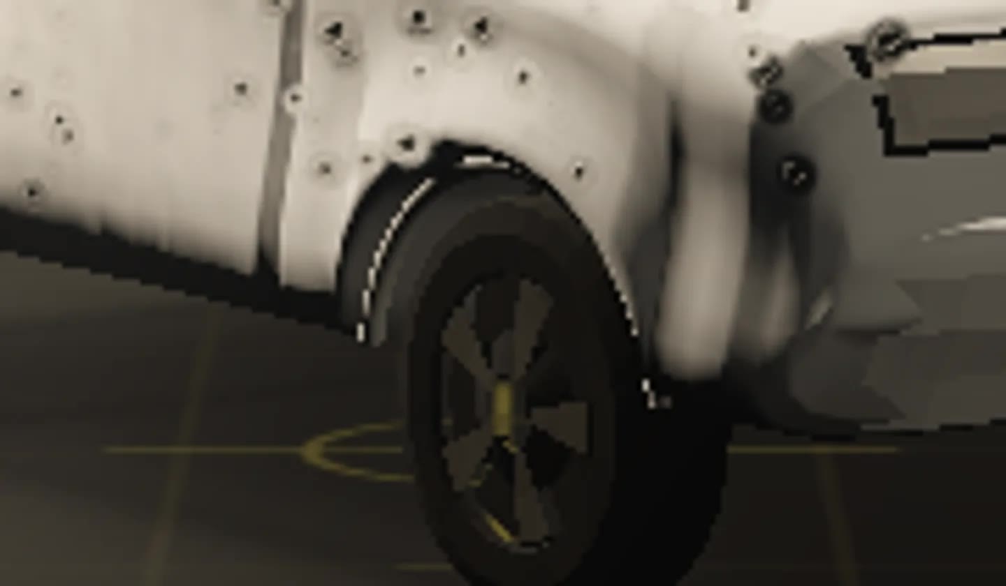 The same magnification after the fix: the front wheel arch lip runs cleanly around the opening and both of its ends stop against the bodywork